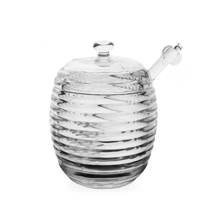 Glazen honingpot met lepel